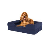 Perro sentado en la cama para perros de espuma de memoria azul medianoche