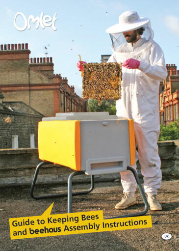 Una guía de apicultura por Omlet - mostrando un apicultor y su Beehaus.