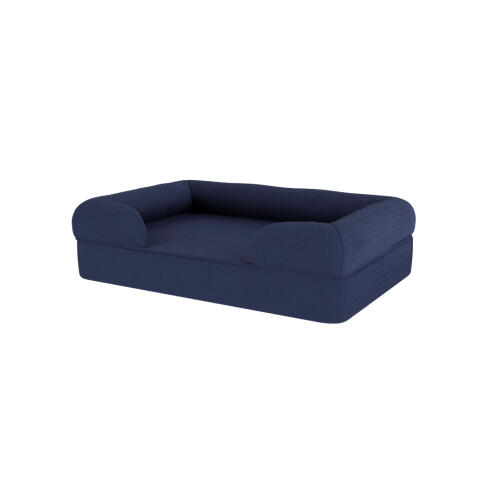 Una cama para perros de espuma con memoria de color azul oscuro.