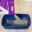 Verter Omlet arena de arcilla para gatos en la bandeja sanitaria