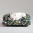 Un bulldog francés durmiendo en la cama para perros midnight meadow bolster